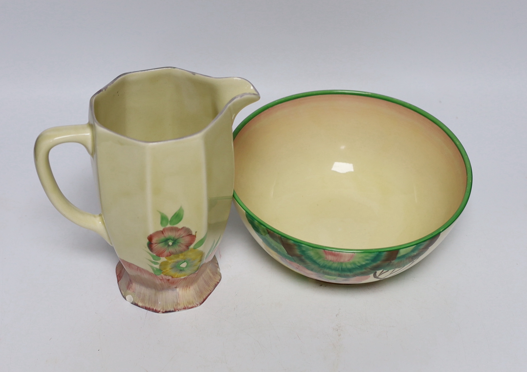 A Clarice Cliff Pink Pearls pattern jug and a related Wilkinson’s Honeyglaze bowl, Aurea pattern, 17cm